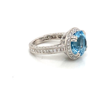 18K White Gold Sky Blue Topaz And Diamond Halo Ring