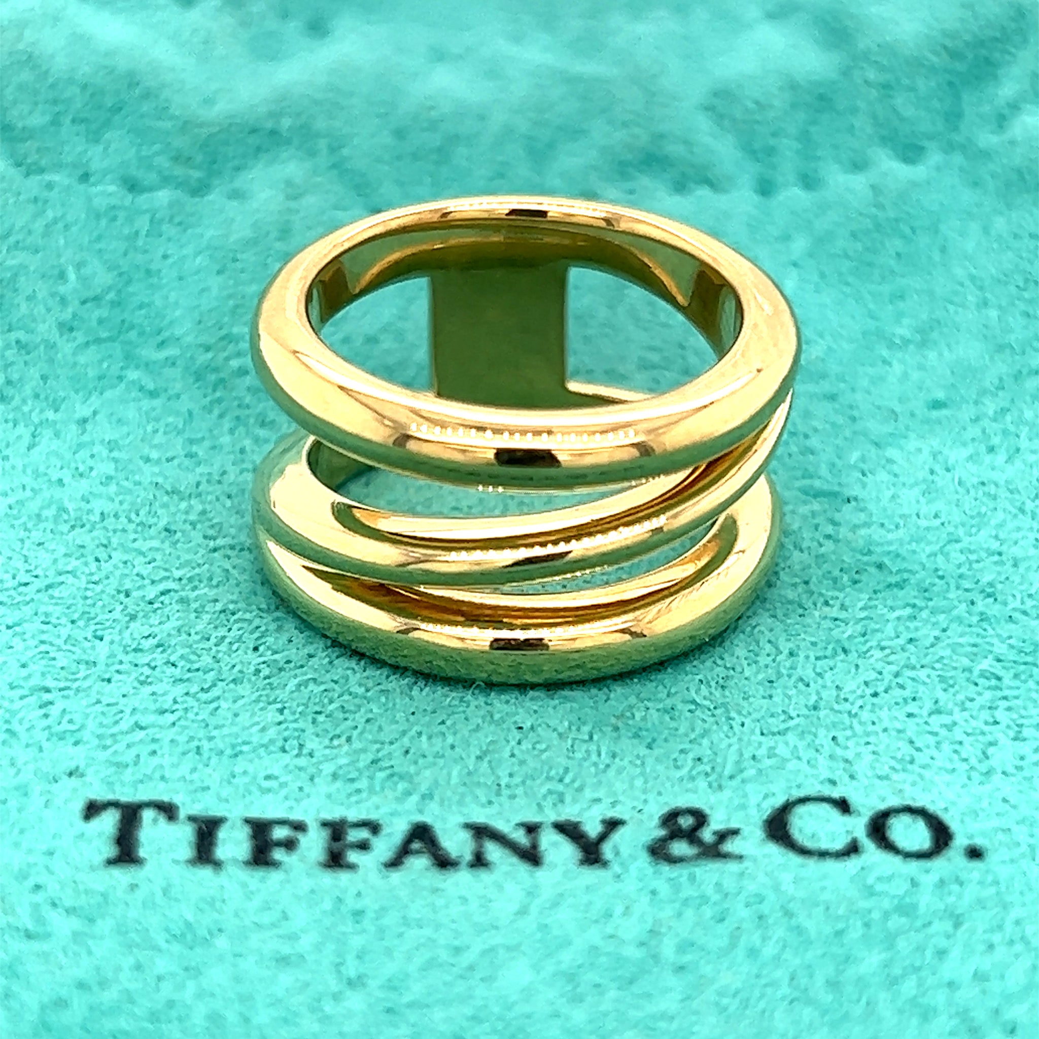 Sold at Auction: Tiffany & Co Picasso 18K Gold Crossover Band Ring