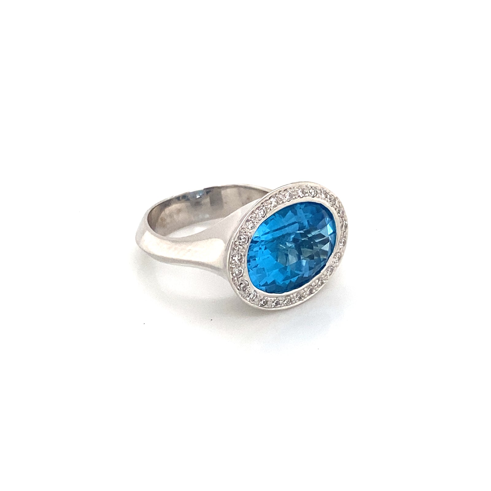 18K White Gold Oval Swiss Blue Topaz & Diamond Halo Ring