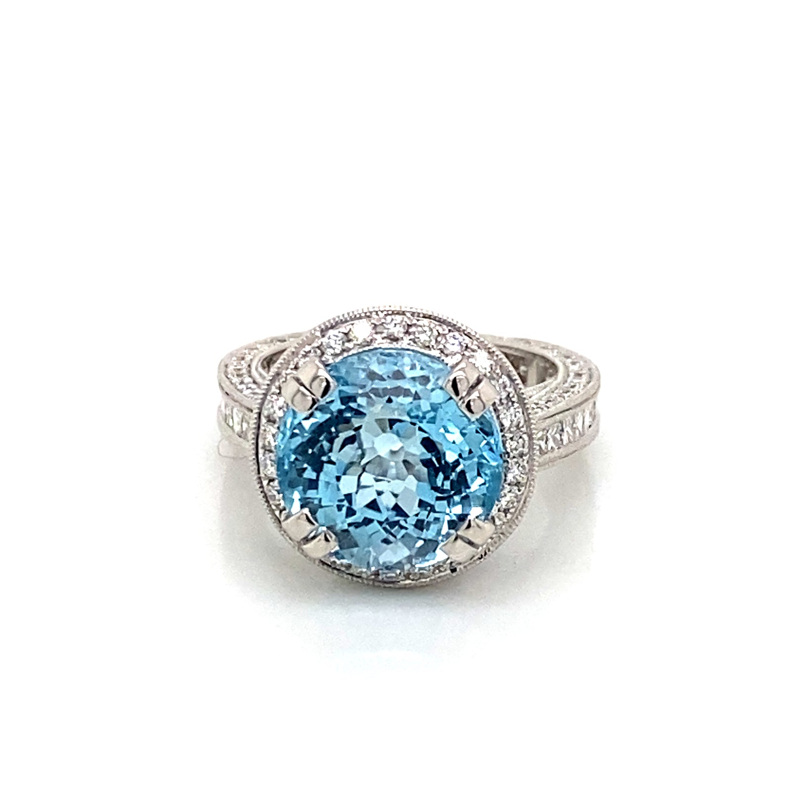 18K White Gold Sky Blue Topaz And Diamond Halo Ring