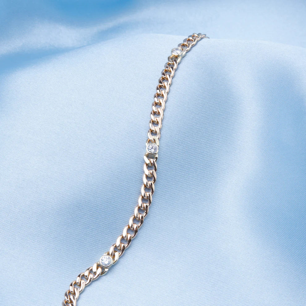 14K Yellow Gold Curb Link Bracelet with Bezel Set Diamonds