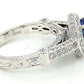 18K White Gold Tanzanite & Diamond Halo Ring